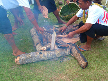 Preparing the umu for lunch